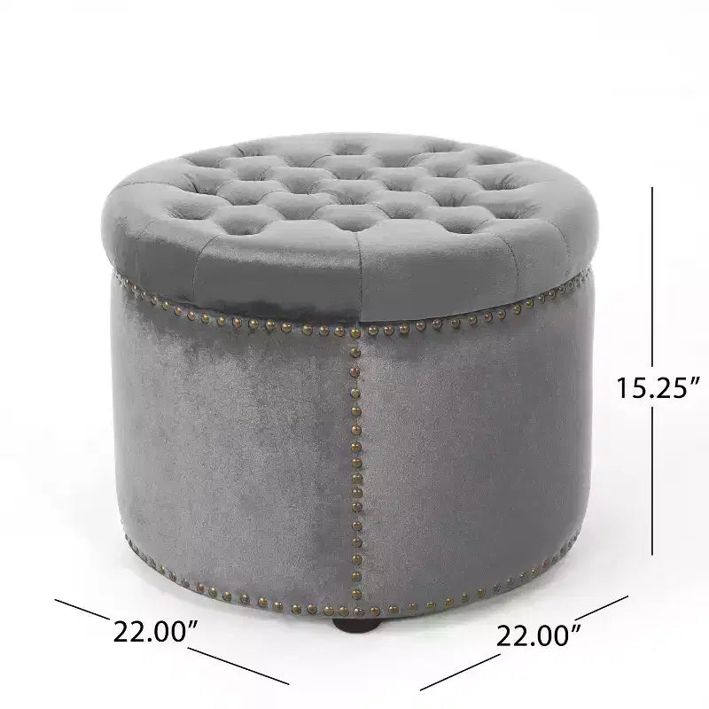 Pouf rond capitonné en velours avec clous de tapissier