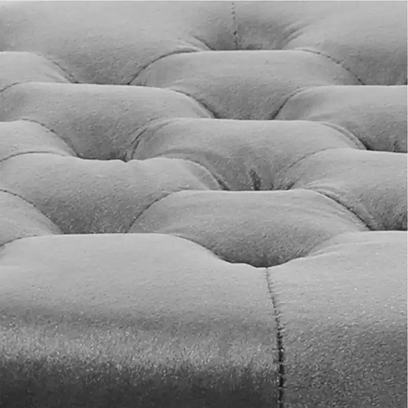 Pouf rond capitonné en velours avec clous de tapissier