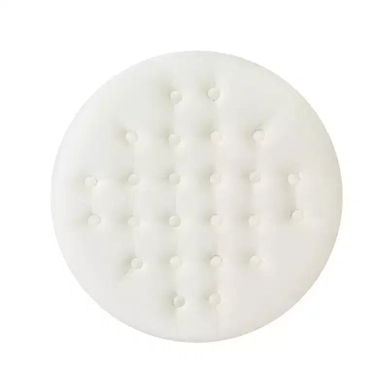Pouf rond capitonné en velours avec clous de tapissier
