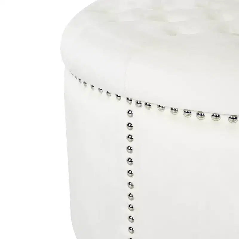 Pouf rond capitonné en velours avec clous de tapissier